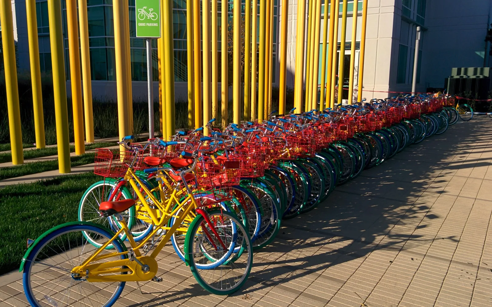 A large number of Google bikes parked at the Tech Corners Google campus in Sunnyvale, California